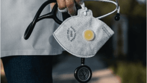 doctor-holding-mask-and-stethescope